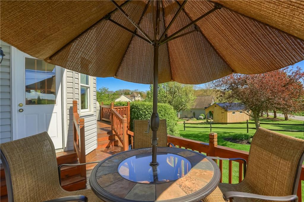 200 Holyoke Road Butler, PA 16001 - Photo 25 of 25 a view of a patio with a table chairs and a backyard