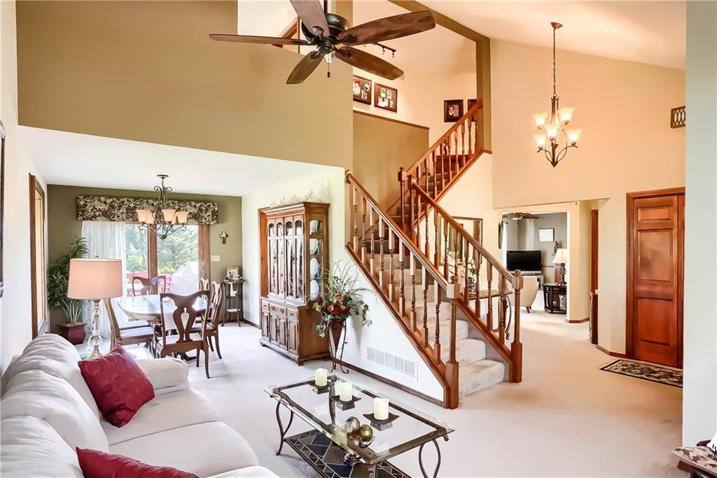 200 Holyoke Road Butler, PA 16001 - Photo 4 of 25 a dining room with furniture water view and a chandelier