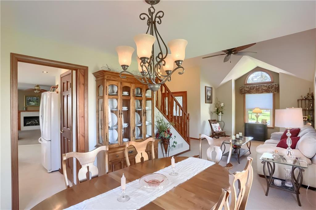200 Holyoke Road Butler, PA 16001 - Photo 6 of 25 a living room with furniture a chandelier and wooden floor