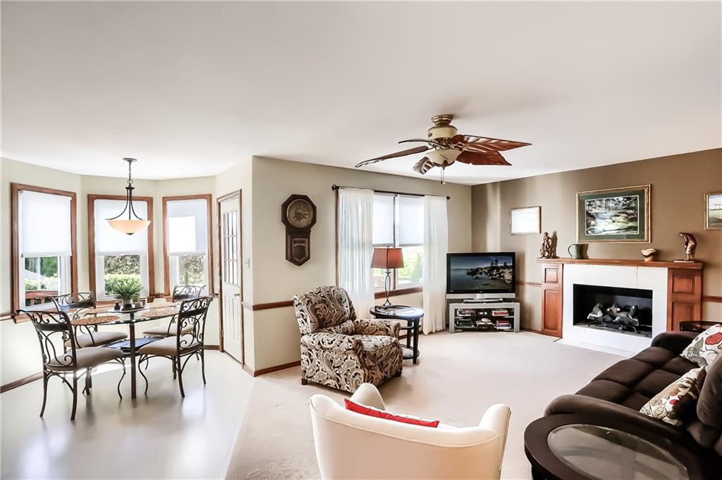 200 Holyoke Road Butler, PA 16001 - Photo 10 of 25 a living room with furniture fireplace and a large window