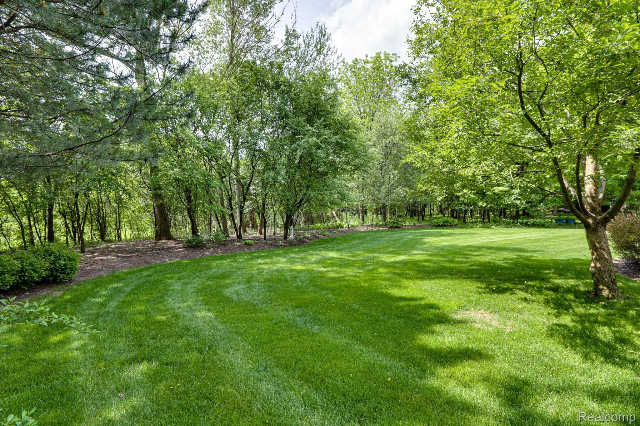 4808 Rivers Edge Drive Troy, MI 48098 - Photo 37 of 40 Gorgeous, private yard set back from the Rouge River