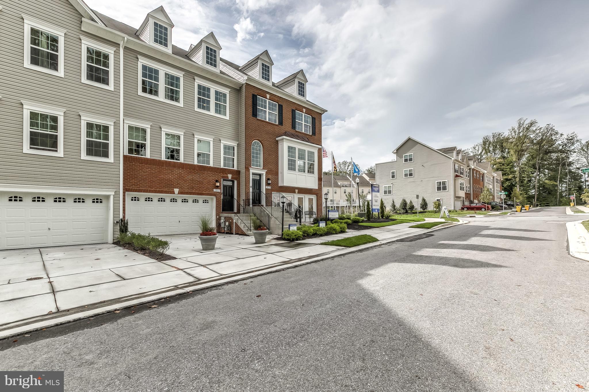2710 Lady Slipper Road Gambrills, MD 21054 - Photo 2 of 46 a street view along with residential houses