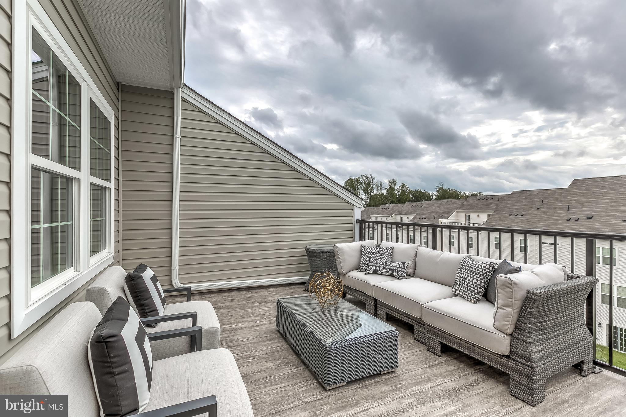 2710 Lady Slipper Road Gambrills, MD 21054 - Photo 34 of 46 a balcony with furniture