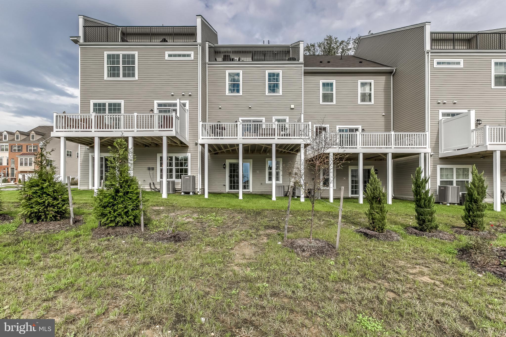 2710 Lady Slipper Road Gambrills, MD 21054 - Photo 45 of 46 a front view of a house with a garden