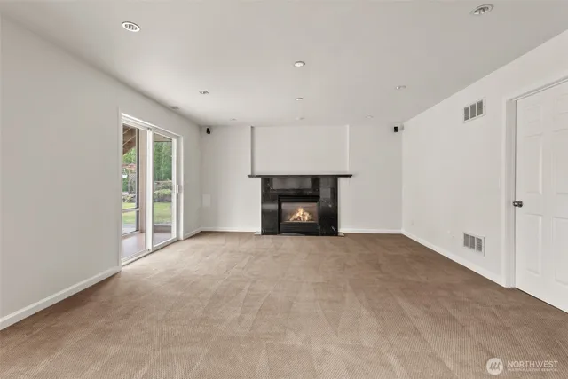 a view of hallway with a large window