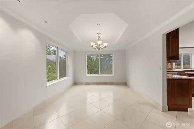 a kitchen that has a sink and a stove