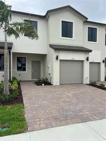 a house view with a outdoor space