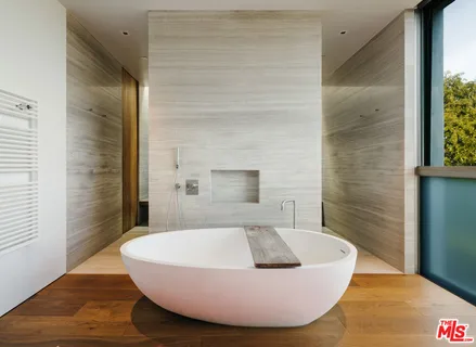 a view of a bathtub in a bathroom