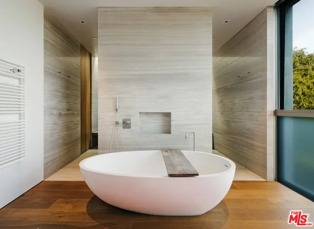 a view of a bathtub in a bathroom