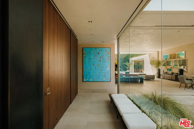 a view of a lobby with chair and tables
