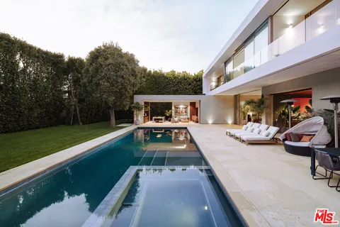 a front view of house with outdoor space