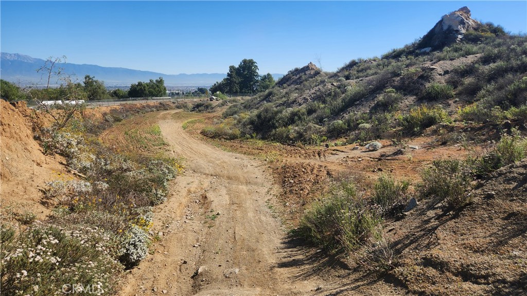 0 Norco Norco, CA 92860 - Photo 12 of 16 a view of a lake with a mountain in the background
