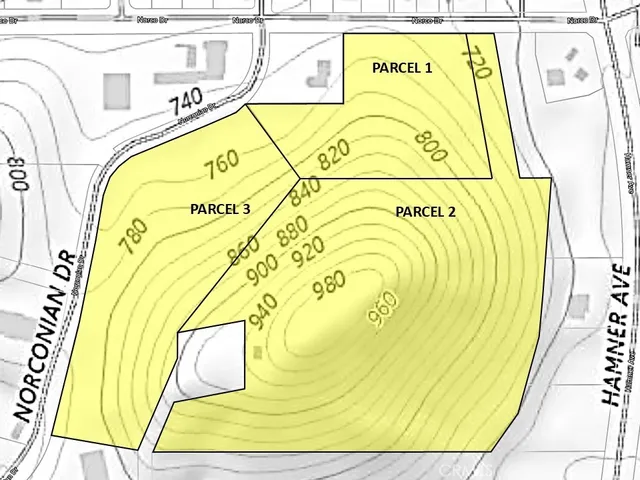 a view of a large mountain with mountains in the background