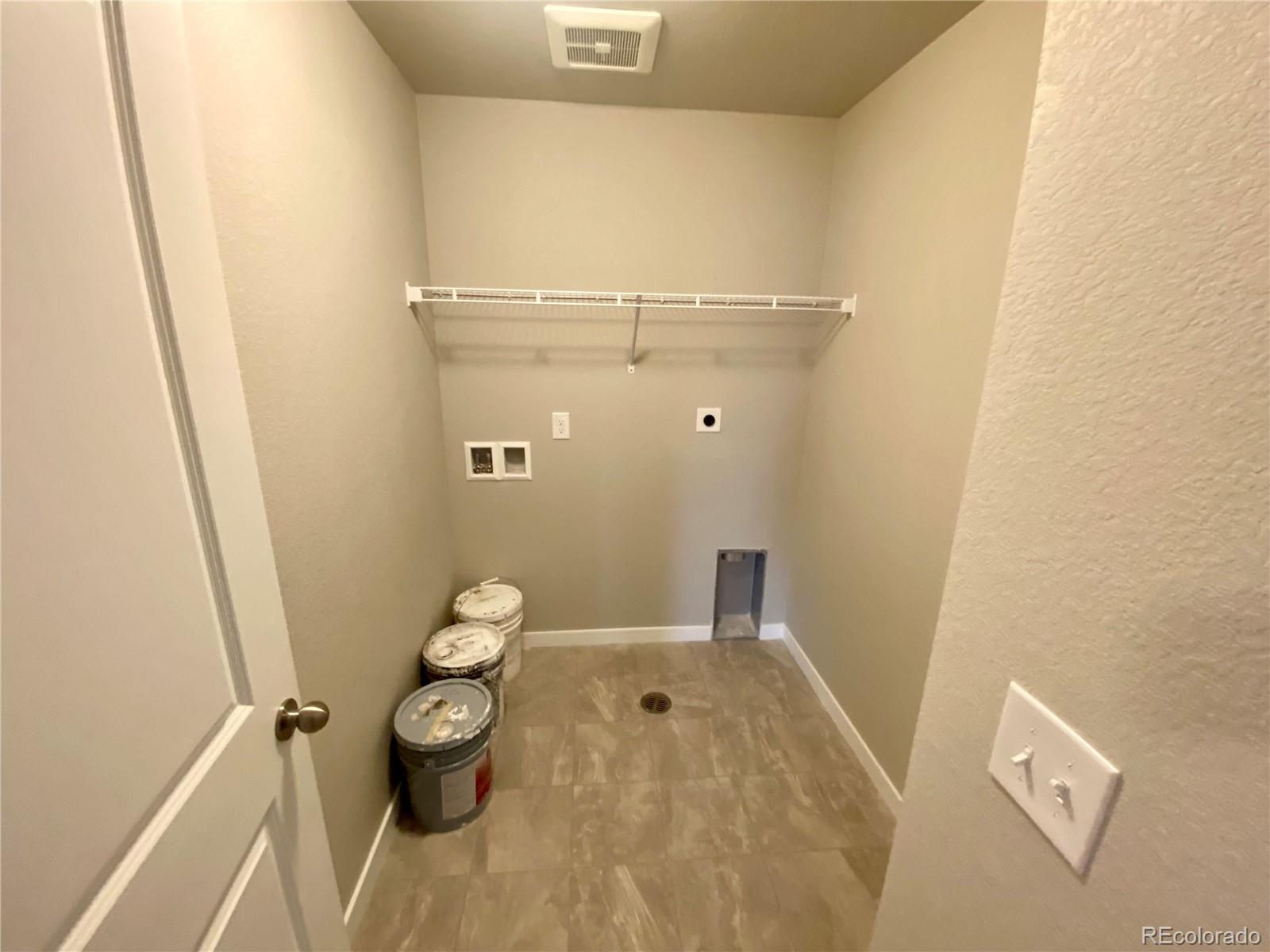517 Ryan Avenue Fort Lupton, CO 80621 - Photo 15 of 21 a bathroom with a granite countertop shower and a sink