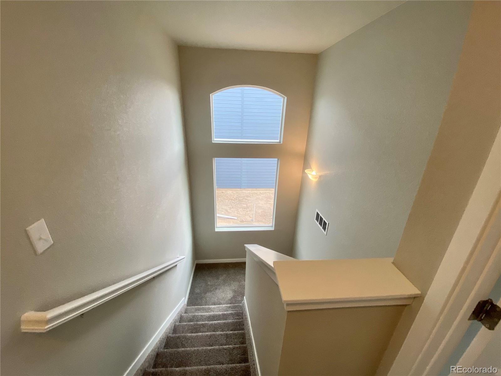 517 Ryan Avenue Fort Lupton, CO 80621 - Photo 8 of 21 a bathroom with a sink and a vanity