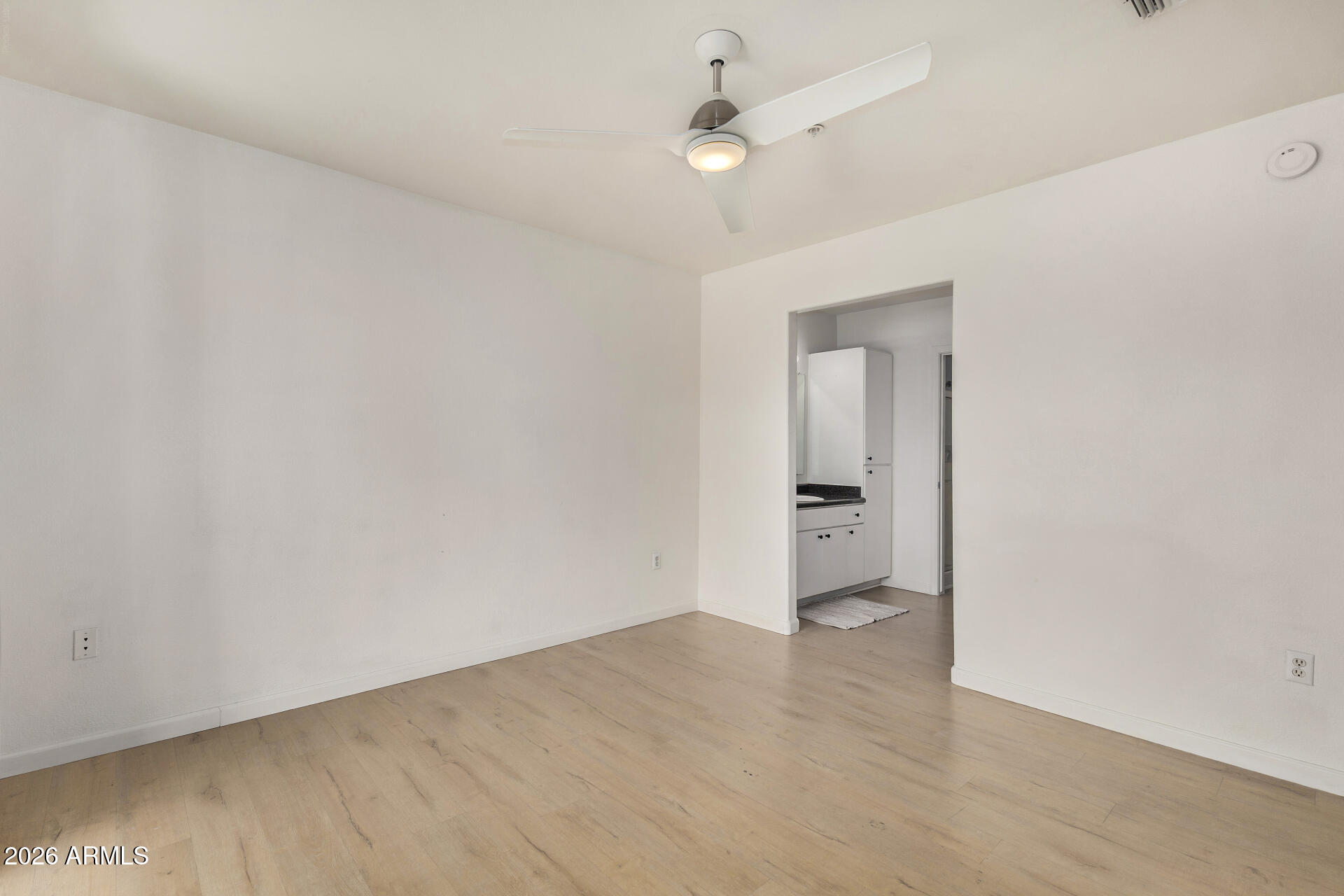 1295 North Ash Street, Unit 828 Gilbert, AZ 85233 - Photo 14 of 43 an empty room with a bathroom