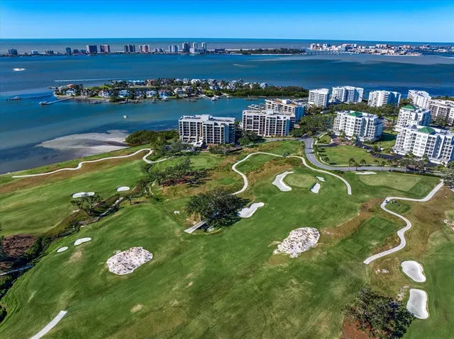 a sign that is in front of flowers