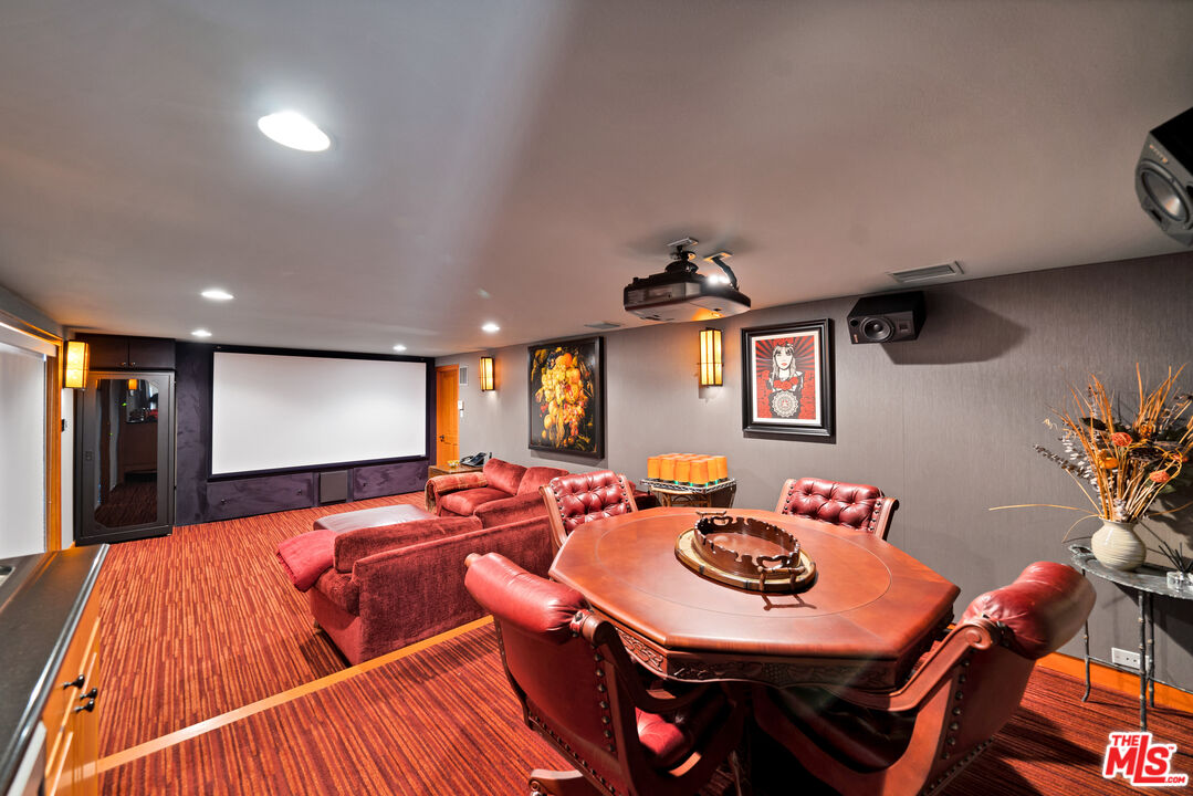 27434 Winding Way Malibu, CA 90265 - Photo 25 of 39 a living room with furniture and wooden floor