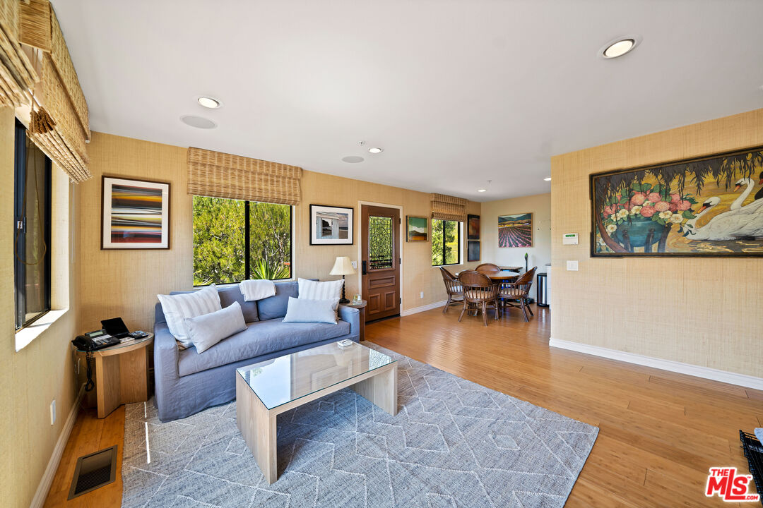 27434 Winding Way Malibu, CA 90265 - Photo 27 of 39 a living room with furniture and a large window