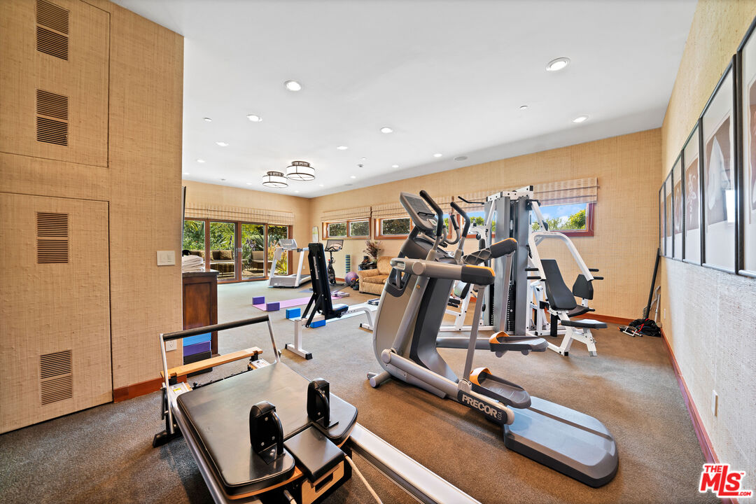 27434 Winding Way Malibu, CA 90265 - Photo 32 of 39 a view of a room with gym equipment