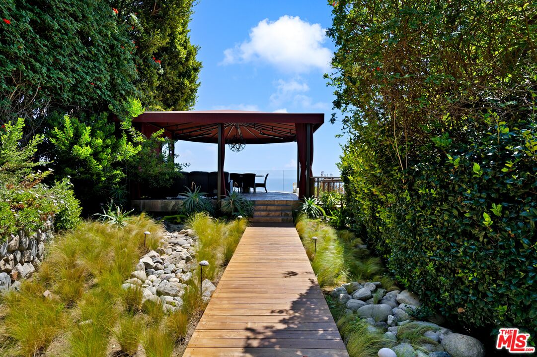 27434 Winding Way Malibu, CA 90265 - Photo 5 of 39 a view of house with garden space