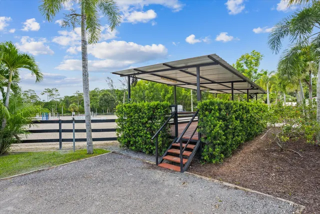 a view of a bench in a garden