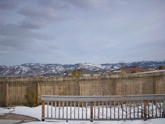 410 Octate Circle Reno, NV 89511 - Photo 8 of 8 a view of a lake with city
