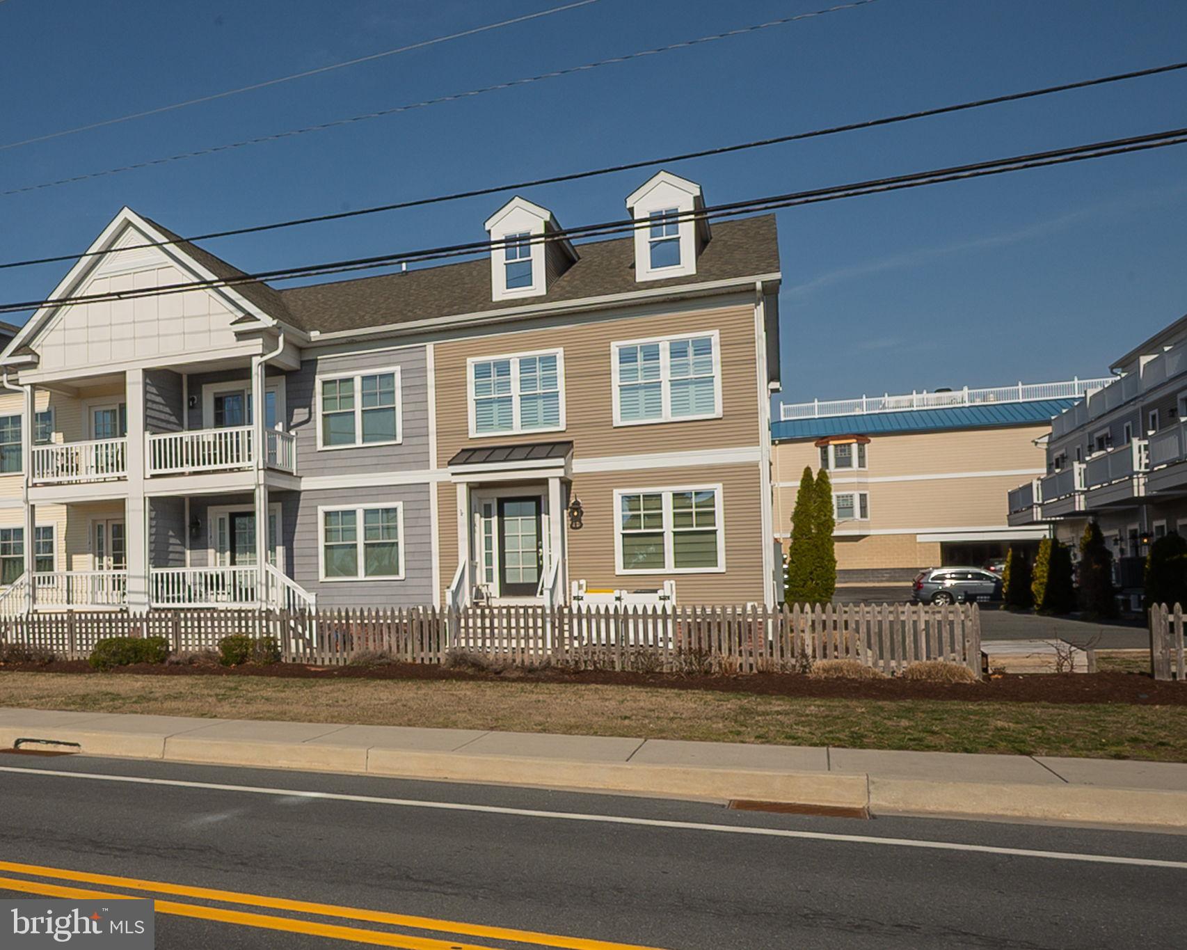 a front view of a house with a porch
