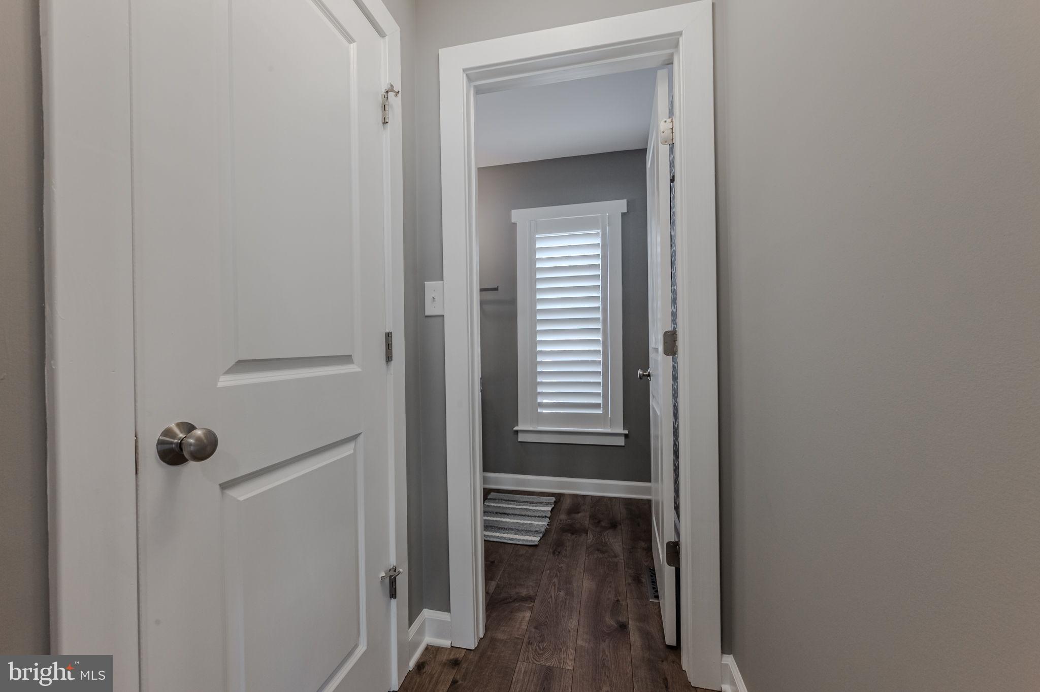100 Anglers Road, Unit A4 Lewes, DE 19958 - Photo 16 of 57 a view of a bathroom from a hallway