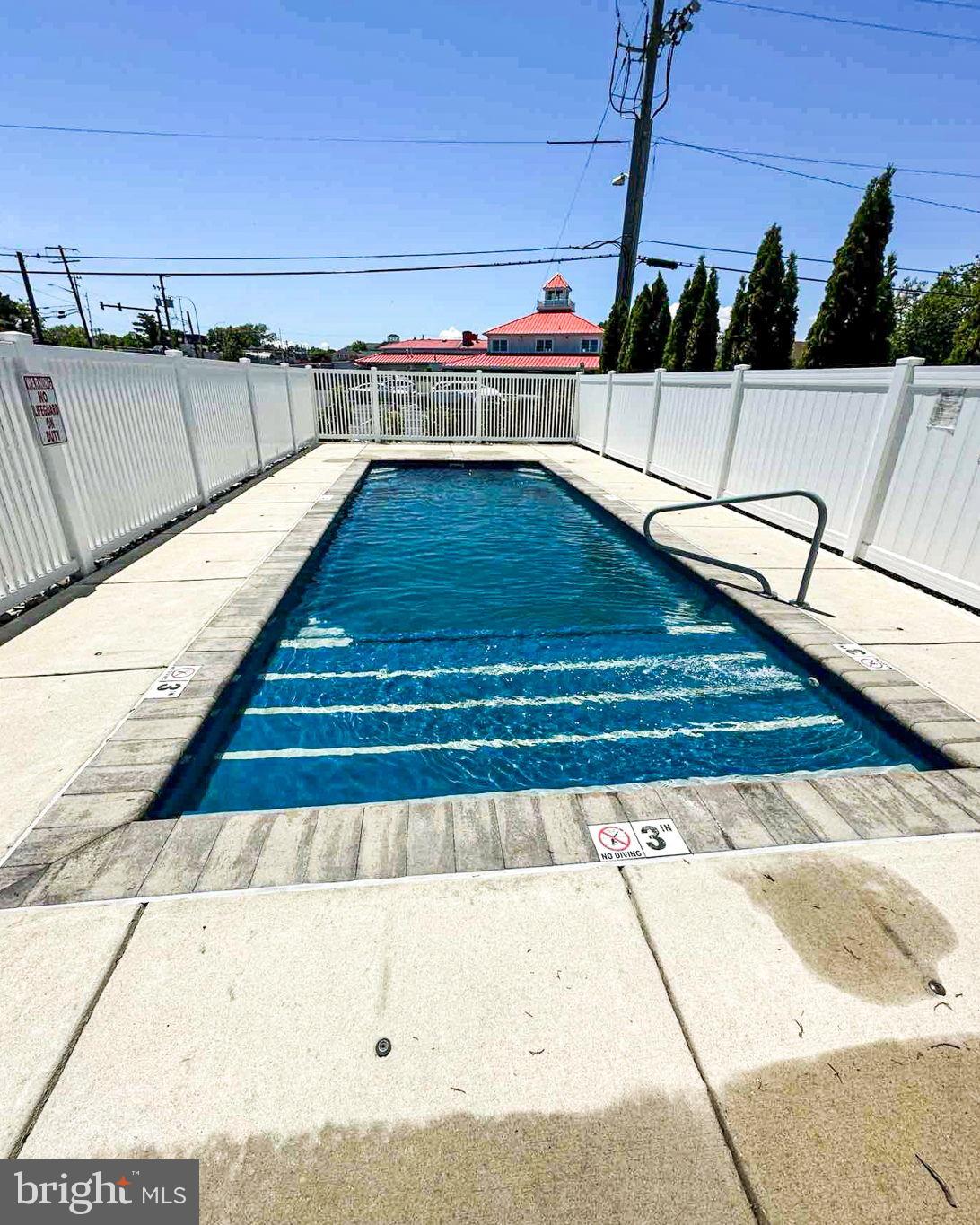100 Anglers Road, Unit A4 Lewes, DE 19958 - Photo 51 of 57 a view of swimming pool with outdoor space