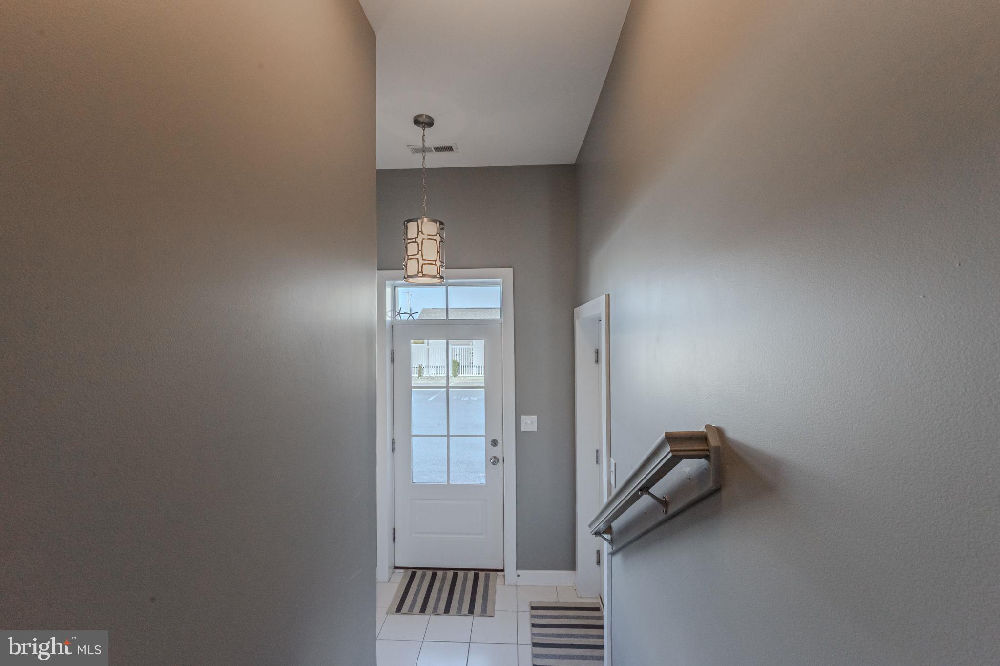 100 Anglers Road, Unit A4 Lewes, DE 19958 - Photo 6 of 57 a view of an empty room with a window