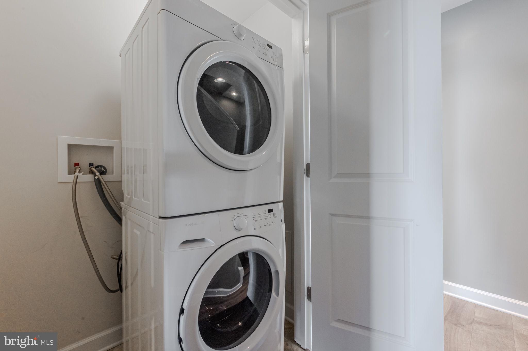 100 Anglers Road, Unit A4 Lewes, DE 19958 - Photo 7 of 57 a utility room with dryer and washer