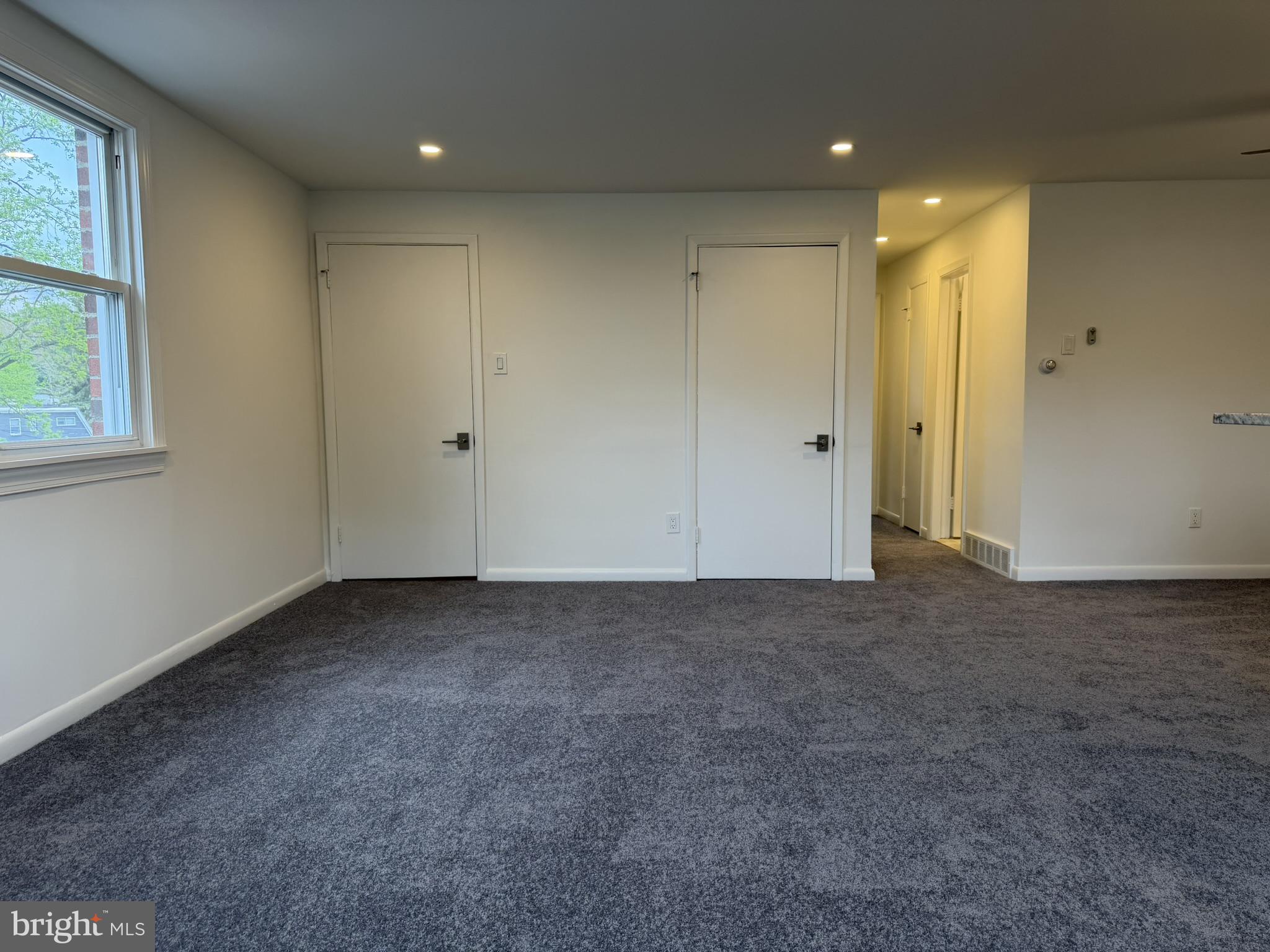 22 Windsor Road, Unit 2 Glenside, PA 19038 - Photo 11 of 29 Spacious, versatile living area awaits.