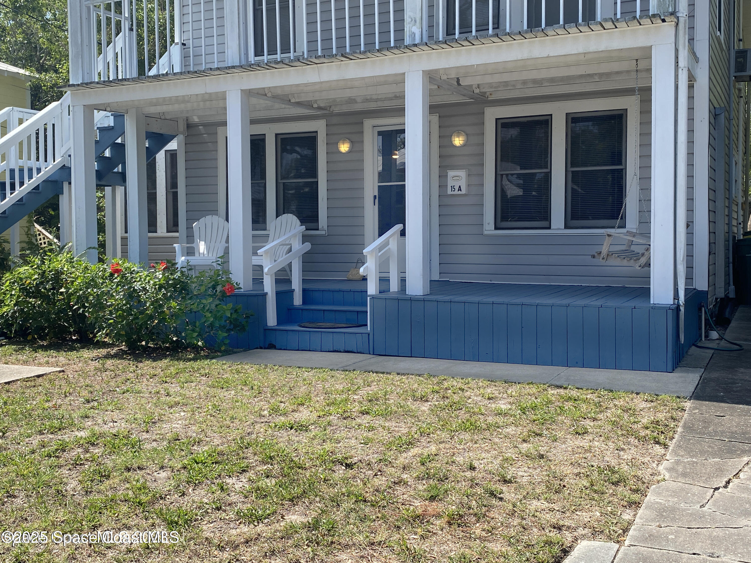 15 Parkway Street, Unit A Cocoa, FL 32922 - Photo 15 of 25 a view of brick house with potted plants
