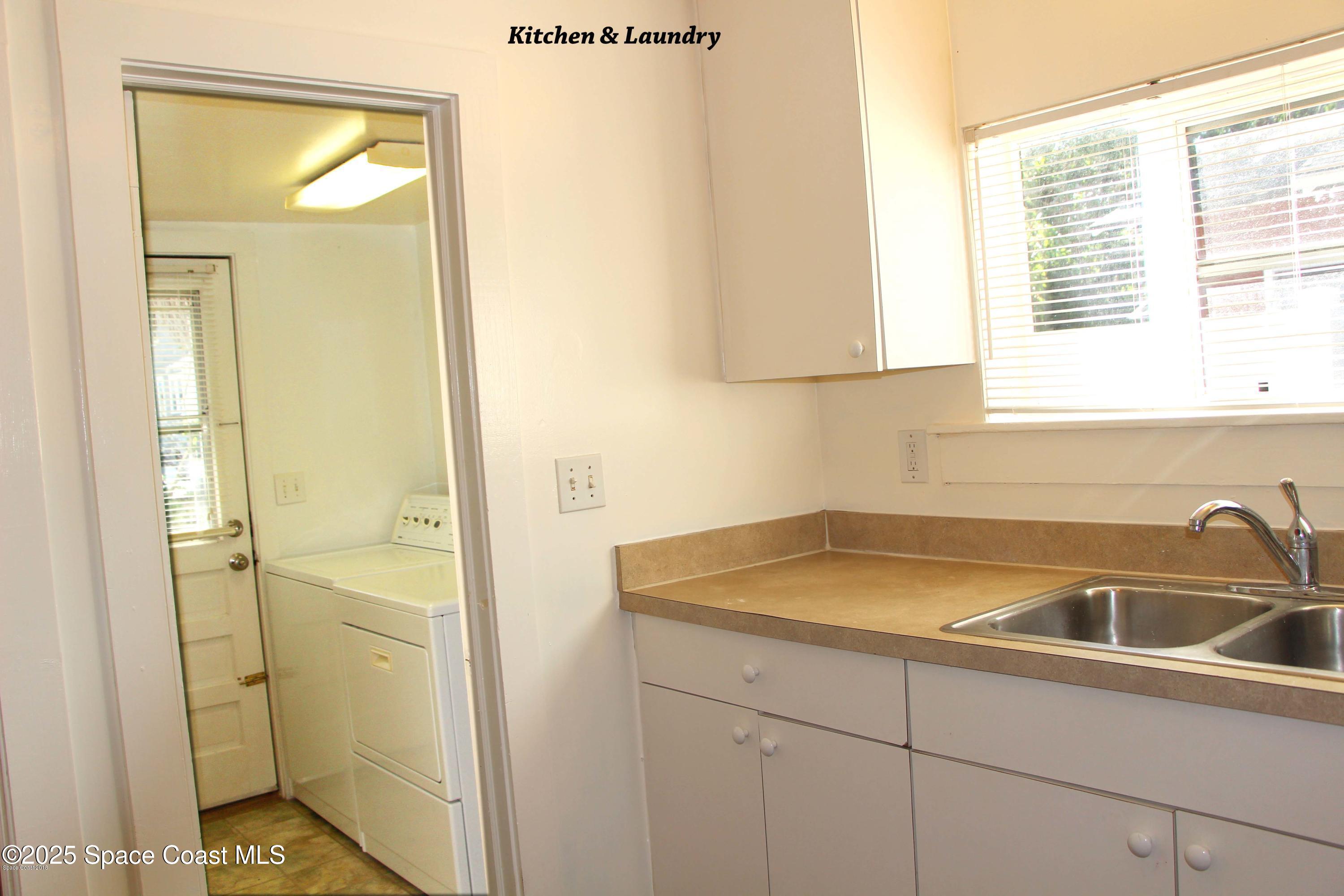 15 Parkway Street, Unit A Cocoa, FL 32922 - Photo 6 of 25 a bathroom with a sink and a window