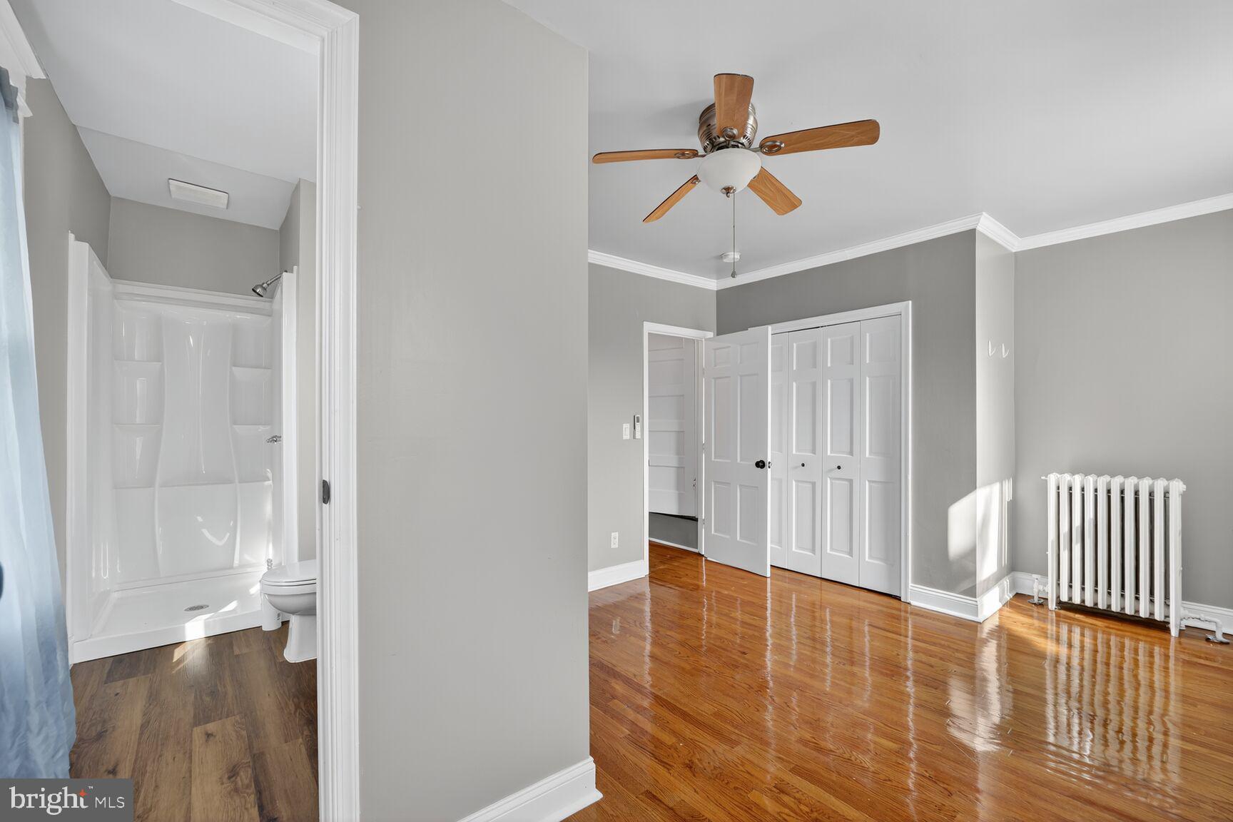 3700 13th Street Northwest Washington, DC 20010 - Photo 12 of 35 a view of a hallway with wooden floor and staircase