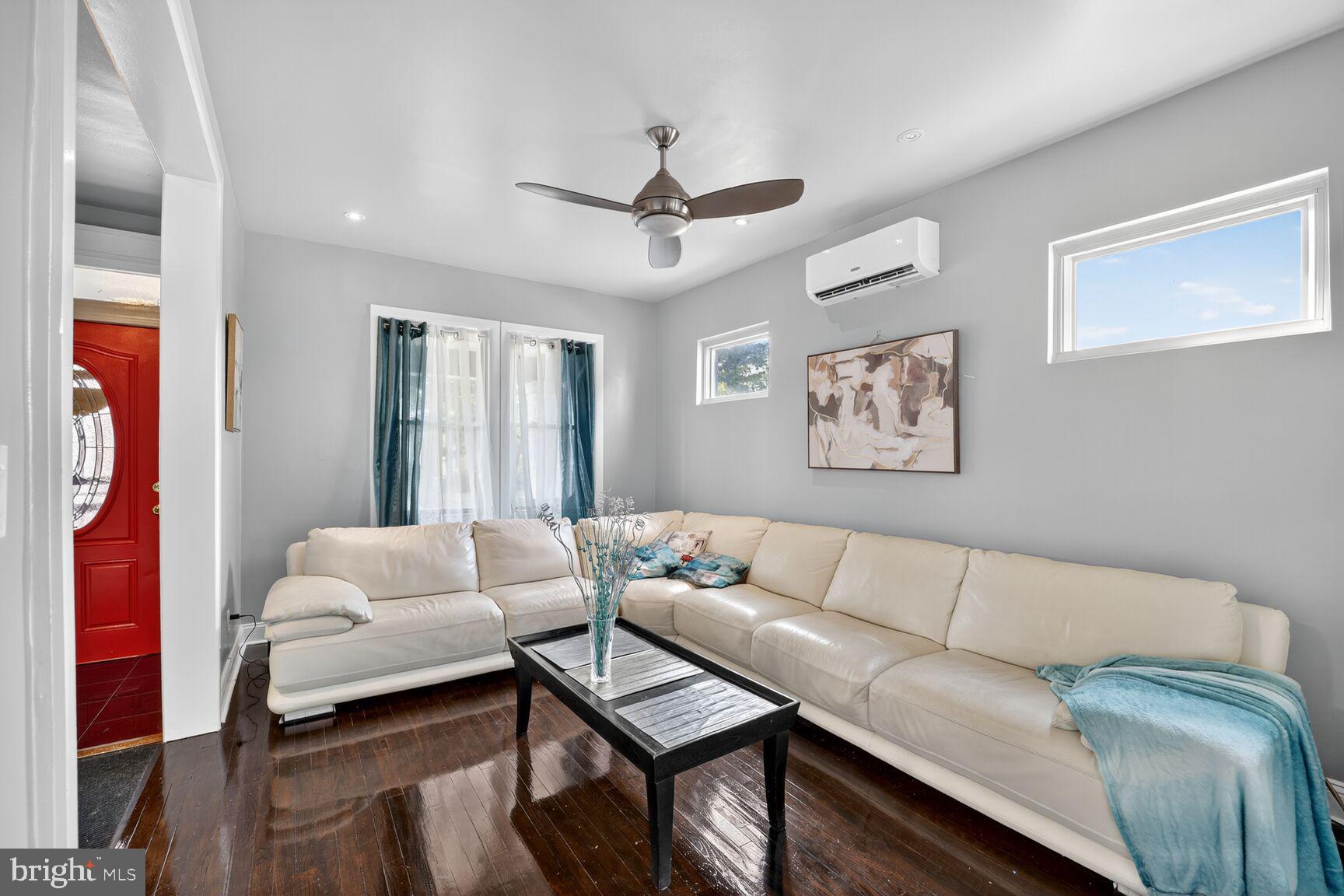 3700 13th Street Northwest Washington, DC 20010 - Photo 4 of 35 a living room with furniture and a couch