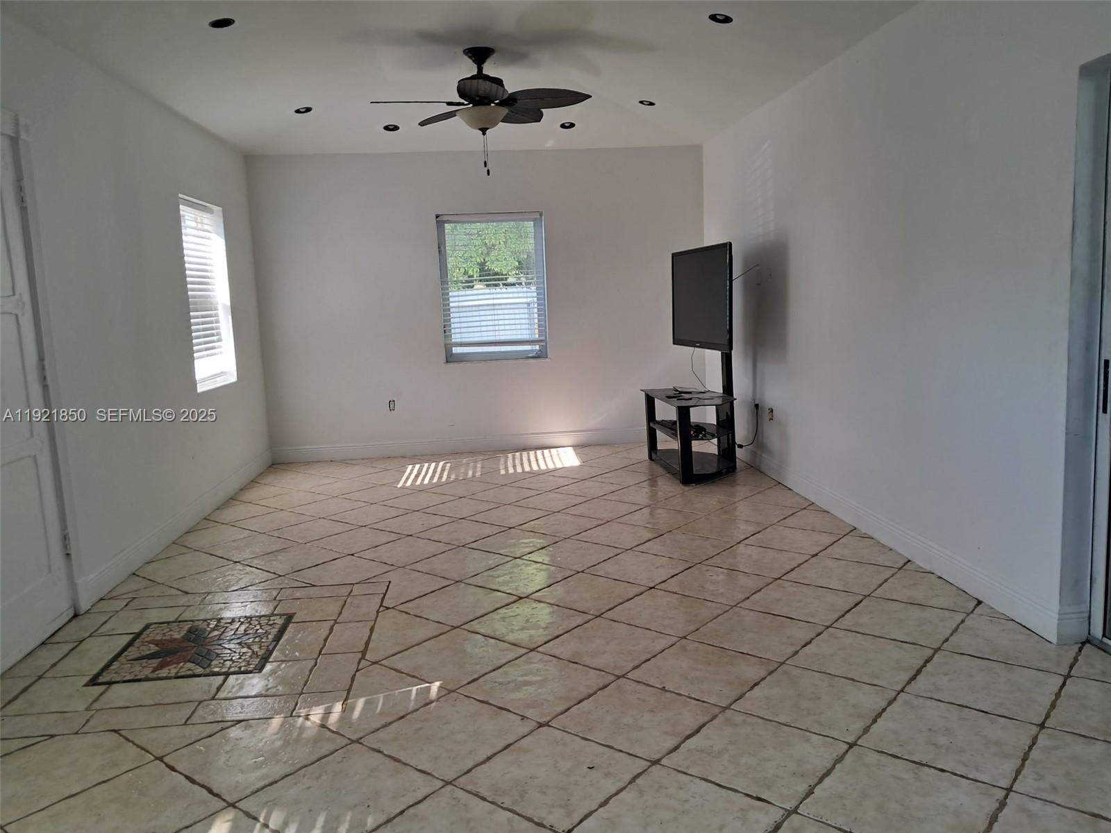 30232 Southwest 172nd Avenue Homestead, FL 33030 - Photo 15 of 31 a view of an empty room and a window