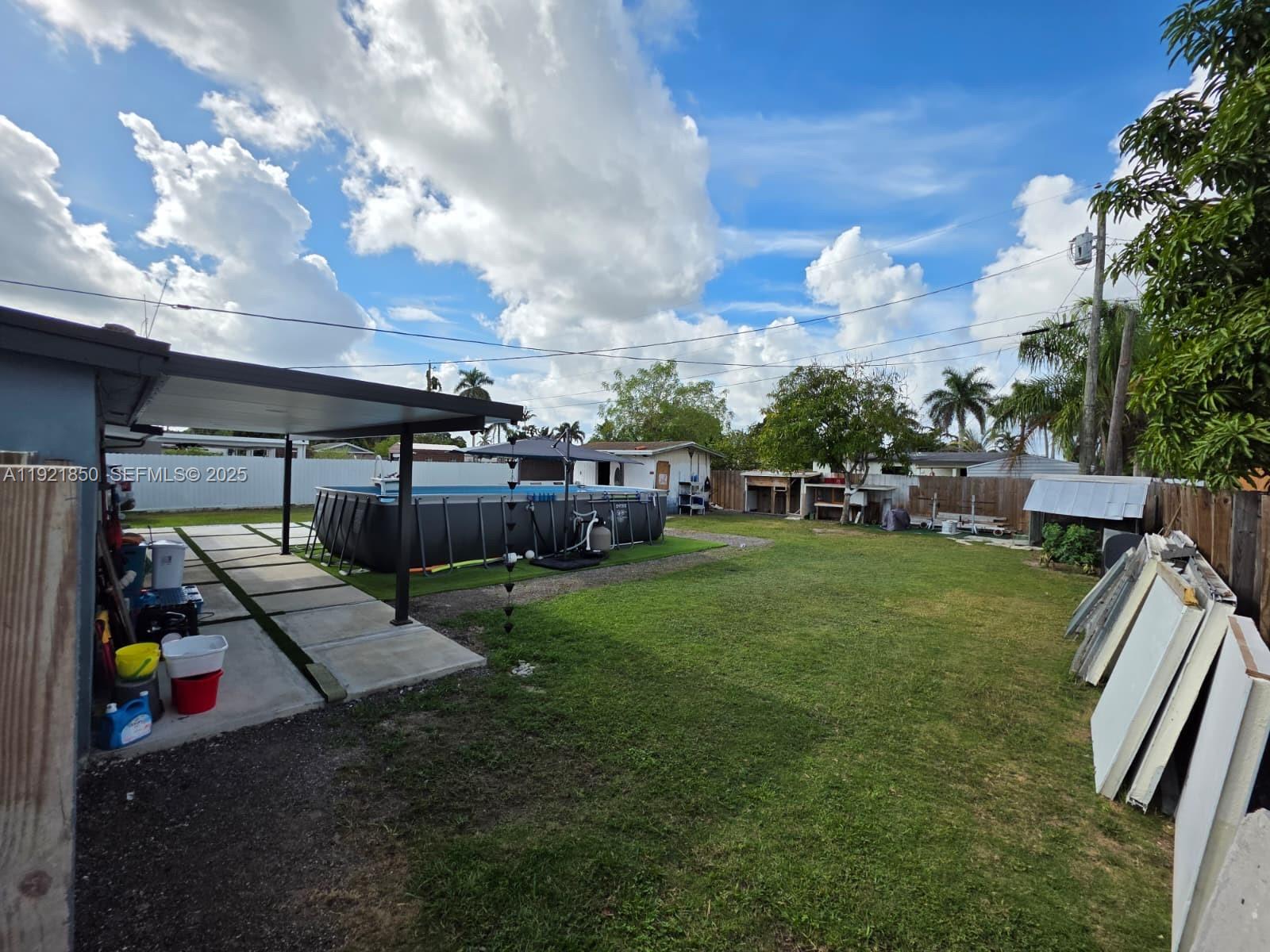 30232 Southwest 172nd Avenue Homestead, FL 33030 - Photo 30 of 31 a view of yard and porch