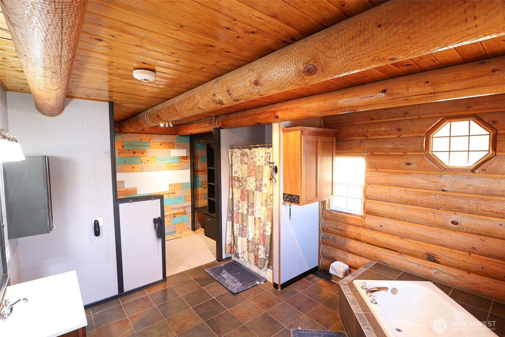 161802 West Buena Vista Road Prosser, WA 99350 - Photo 11 of 21 a view of a hallway with bathroom and mirror