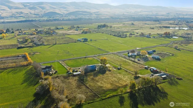 a view of an ocean and a mountain