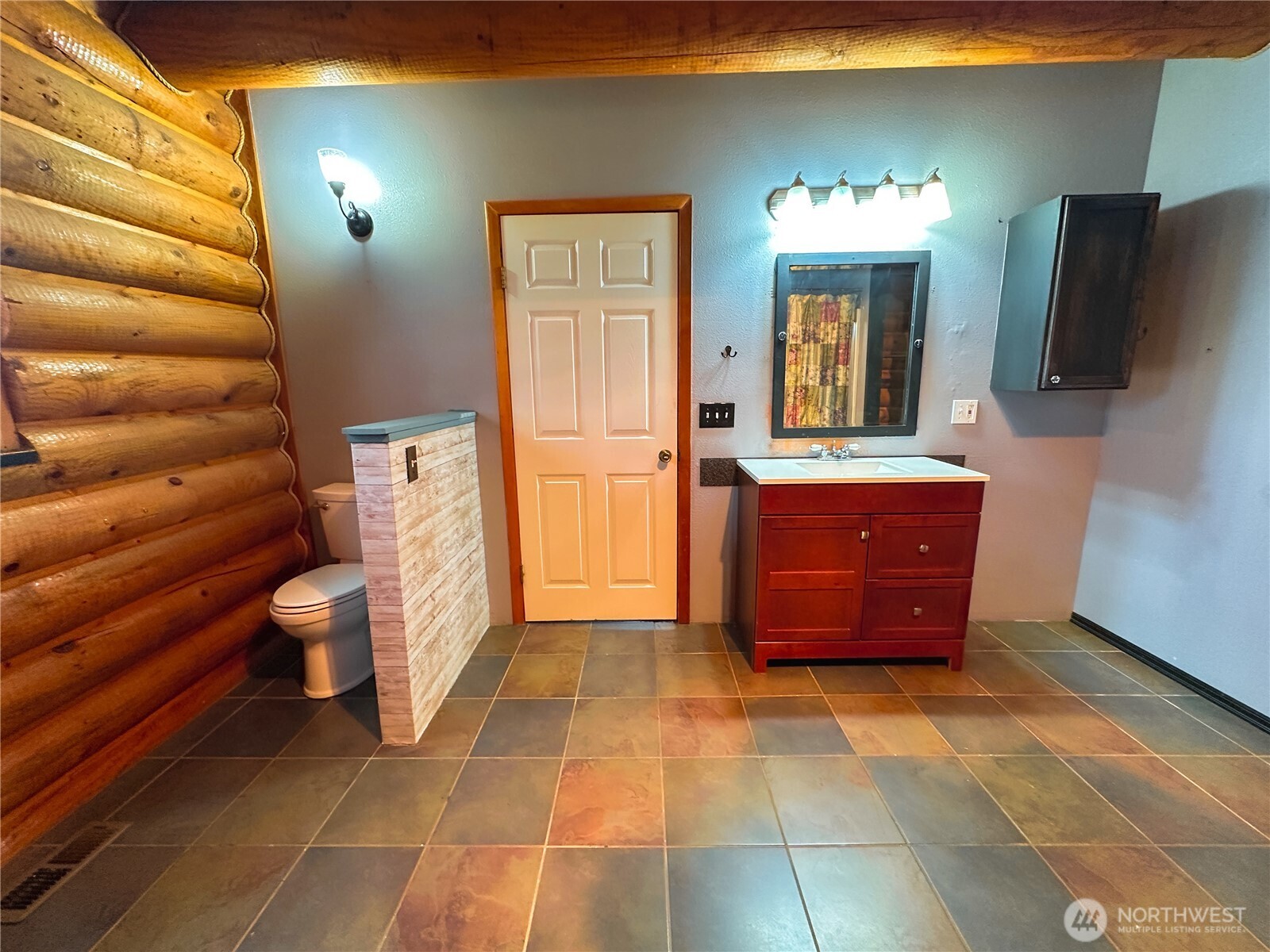 161802 West Buena Vista Road Prosser, WA 99350 - Photo 25 of 40 a bathroom with a sink a toilet and a mirror