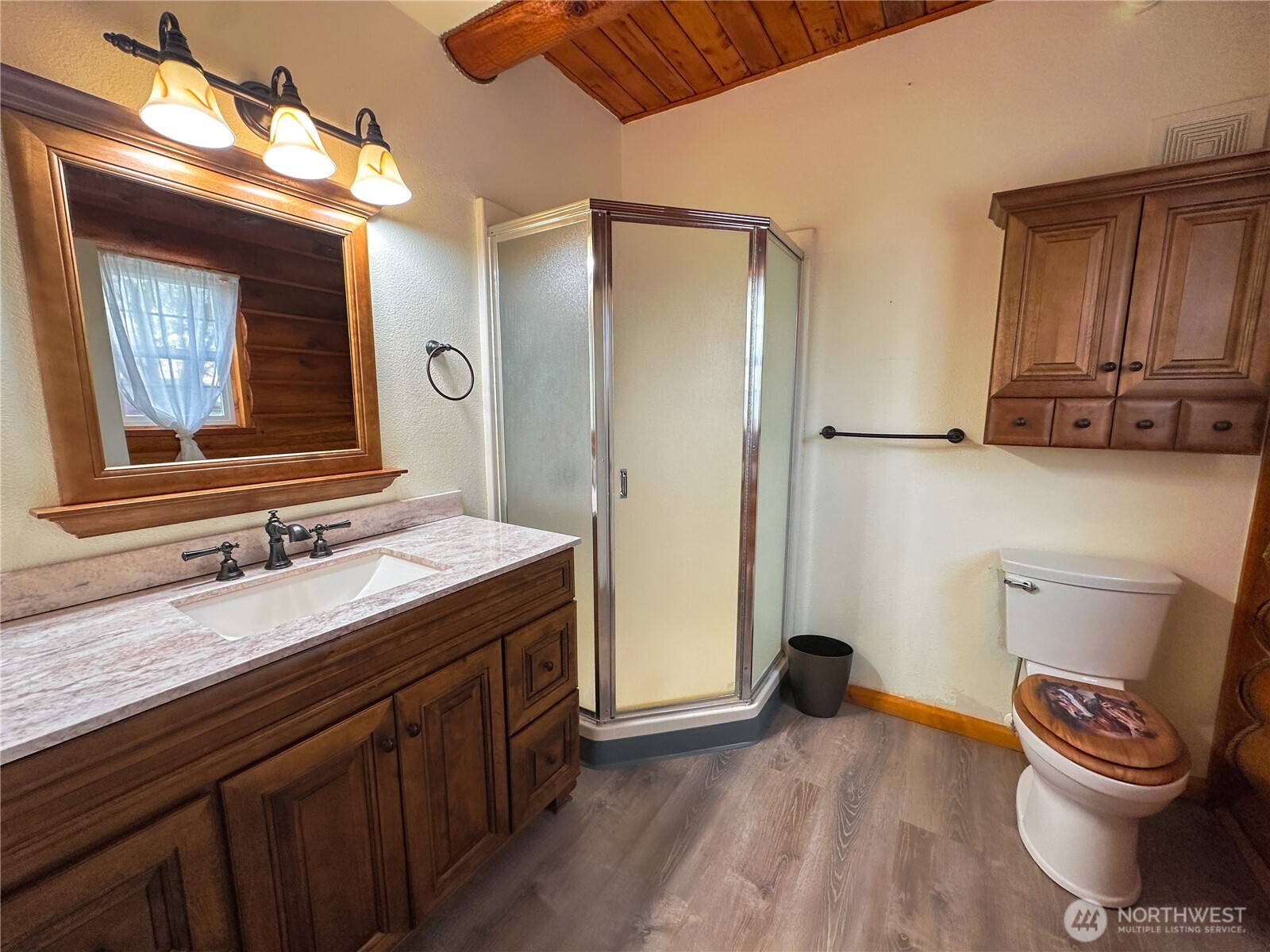 161802 West Buena Vista Road Prosser, WA 99350 - Photo 26 of 40 a bathroom with a sink a toilet and a mirror