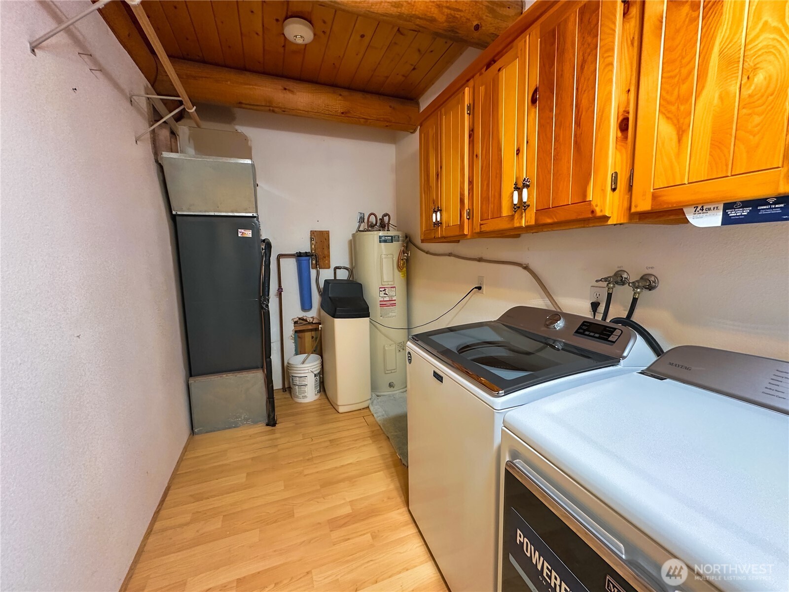 161802 West Buena Vista Road Prosser, WA 99350 - Photo 27 of 40 a kitchen with a sink a refrigerator and cabinets