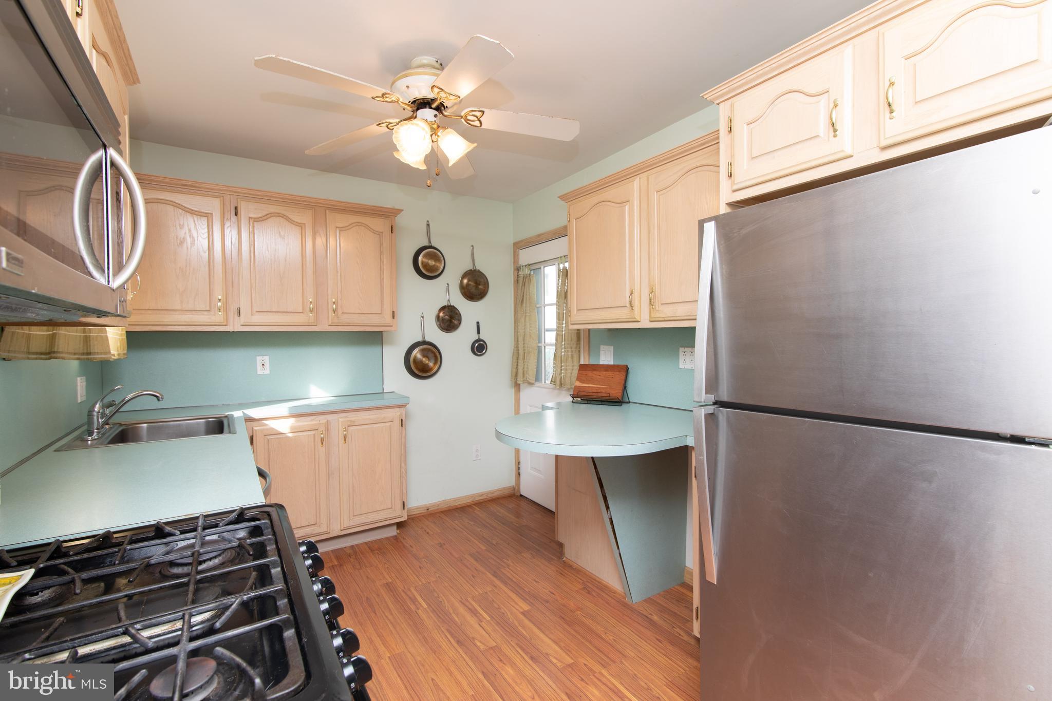 685 Cypress Road Warminster, PA 18974 - Photo 12 of 41 Loads of cabinet space and bump out island.
