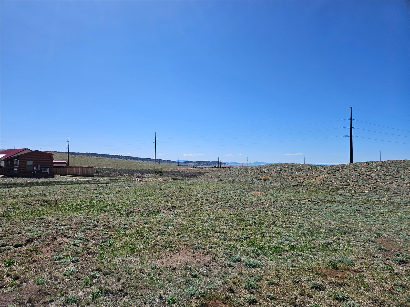 Lot R-06 Lot R-06 Meadow Drive Fairplay, CO 80440 - Photo 49 of 50 a view of a field with a fence