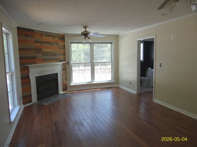 144 Old Sardis Church Road Clayton, AL 36016 - Photo 13 of 34 an empty room with wooden floor fireplace and windows