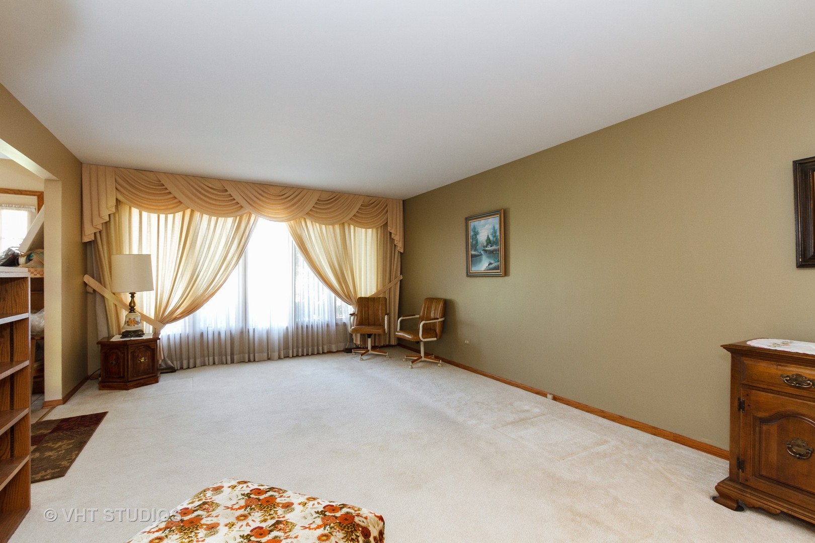 6931 Coachwood Trail Tinley Park, IL 60477 - Photo 2 of 11 a bed room with a bed and a chair