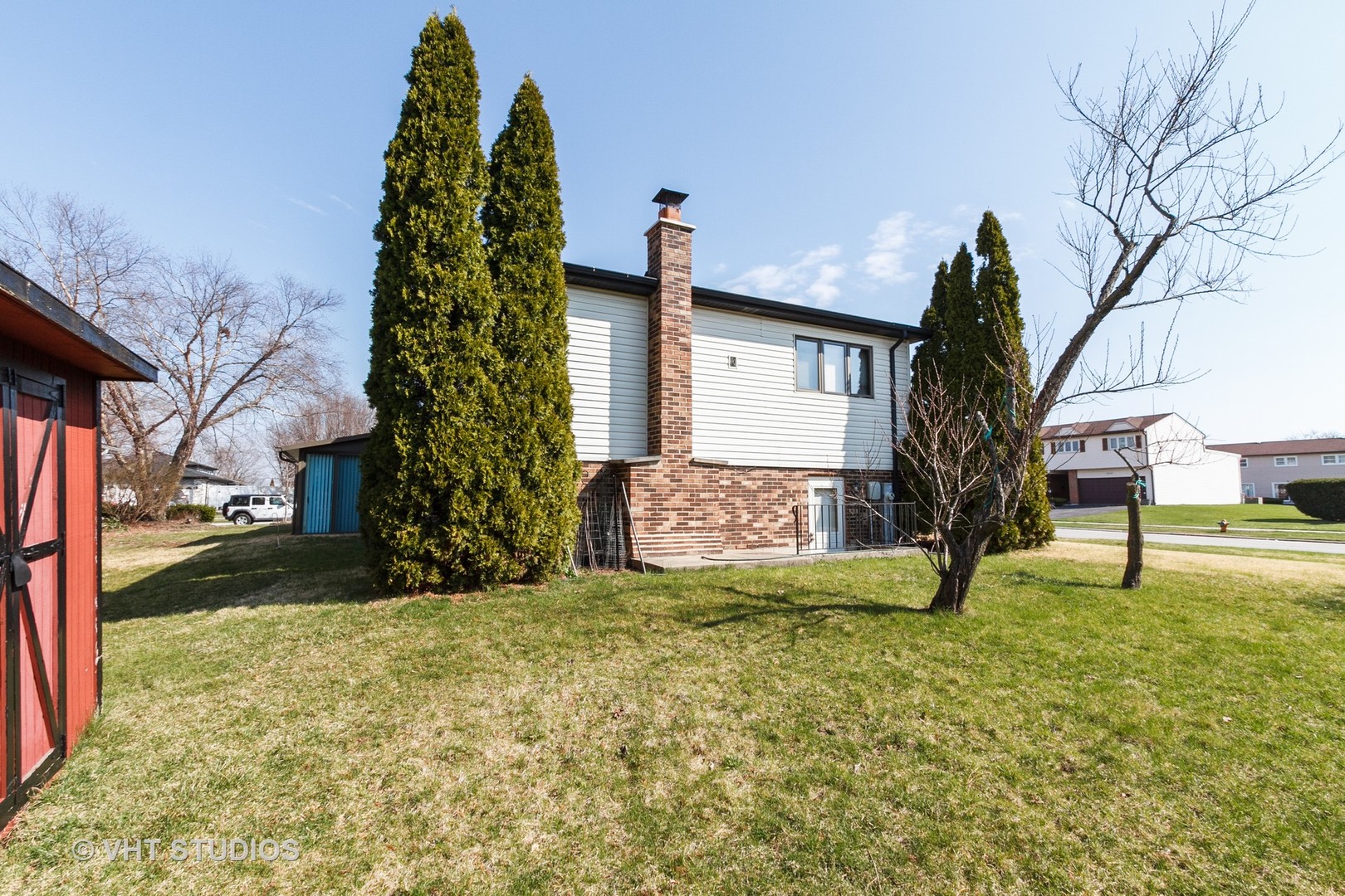 6931 Coachwood Trail Tinley Park, IL 60477 - Photo 11 of 11 a view of a house with a yard and tree s