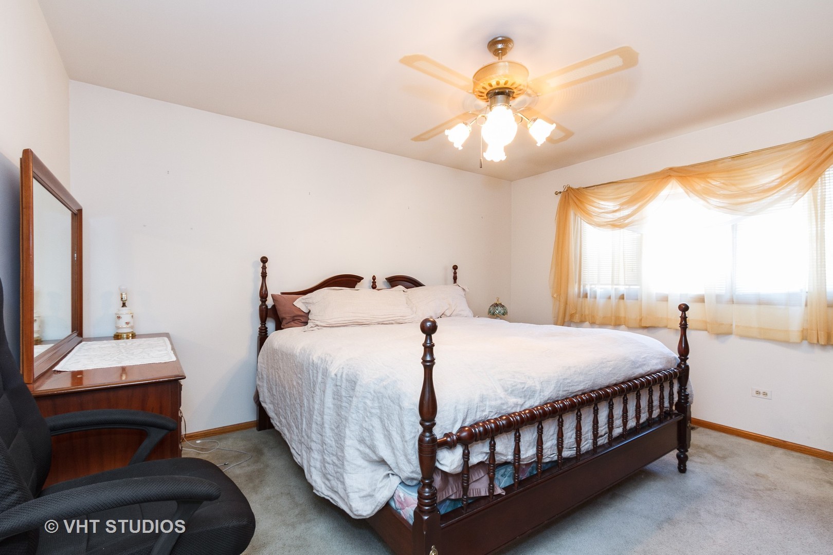 6931 Coachwood Trail Tinley Park, IL 60477 - Photo 6 of 11 a bedroom with a bed and a chandelier